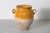 This charming 19th-century Spanish terracotta pottery jar showcases the rustic elegance of traditional ceramic...