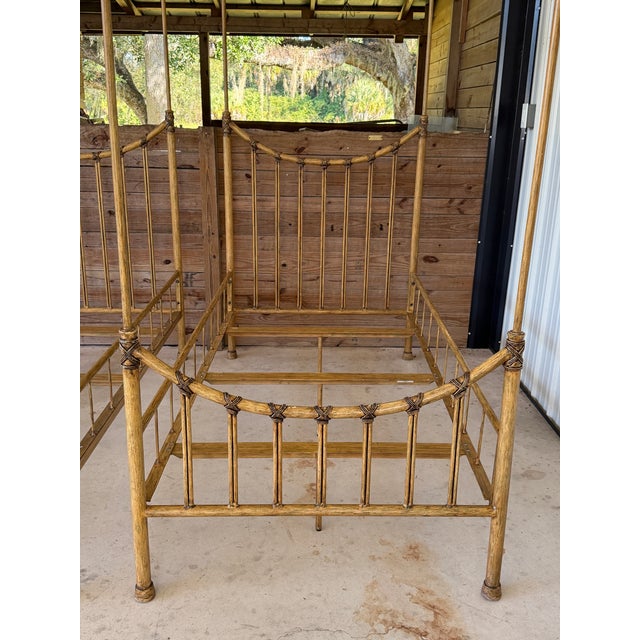 An impressive pair of twin canopy beds crafted from extremely heavy metal with decorative faux bamboo detailing. Tall,...