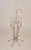 Midcentury Modern umbrella stand, decorative and functional. Thin metal with golden color finish. Nice patina, normal...