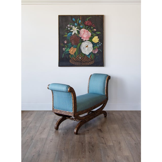 A beautifully sculptural antique curule bench, newly upholstered in a tailored Schuyler Samperton fabric that brings a...