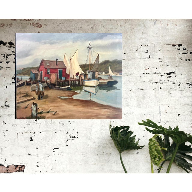 Attractive and competently painted canvas depicting a peaceful and tranquil harbour scene, a group of fishing boats, a red...
