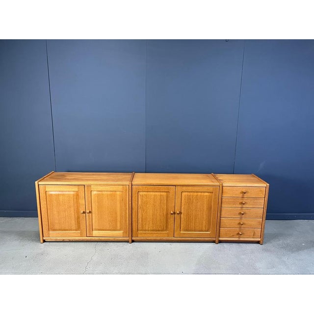 High quality wood sideboard with 4 doors and a 5 drawer compartment offering plenty of storage space. Niocely shaped small...