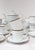 All pieces are signed. The design corresponds to the CRISTAL or PALMYRE model with navy blue and fine gold trim. The set...