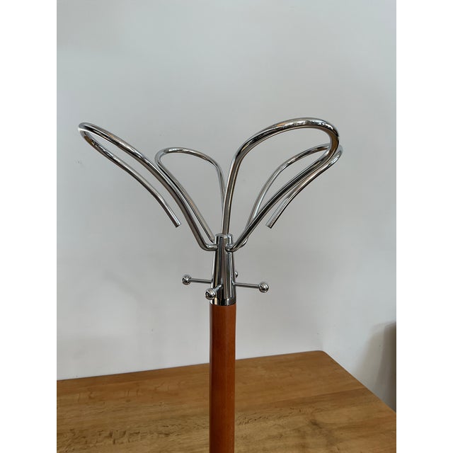 Make an architectural statement in your entryway with this rare and striking Atomic-style "Lotus" hall tree. Designed in...