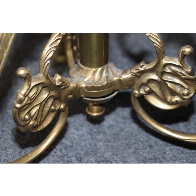 This is a gorgeous end table in the French Regency style, made of marble and bronze. The table is in good condition, with...