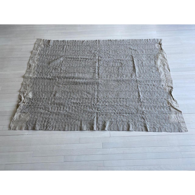 Neutral tones in this cotton and linen vintage textile from Africa. Eyelet design and linen patchwork on both ends. Great...