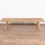 The appeal of this rustic coffee table comes from the thick wood top that originally served as a worktable. The splayed...