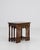 A set of three oak nesting tables from France, dating to circa 1970, designed with a compact and functional structure....