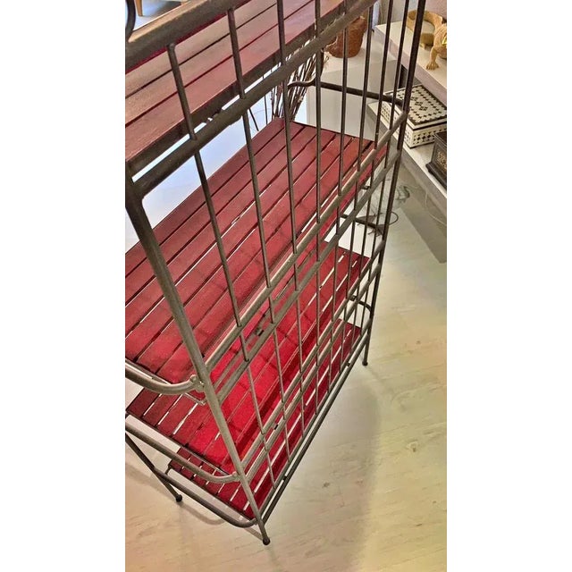 Spanish bookshop 20th century perfect condition 158cm x 84cm x 34cm wood and iron. This piece is attributed to the...