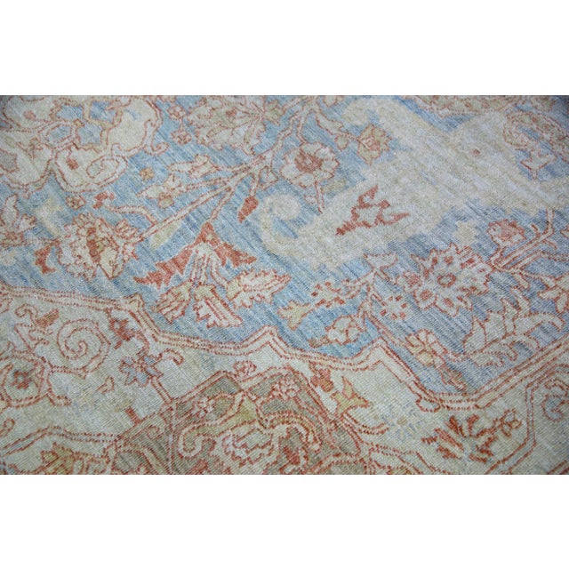 This modern finewoven Turkish Oushak rug is a stunning piece of art that has been handwoven using traditional techniques...