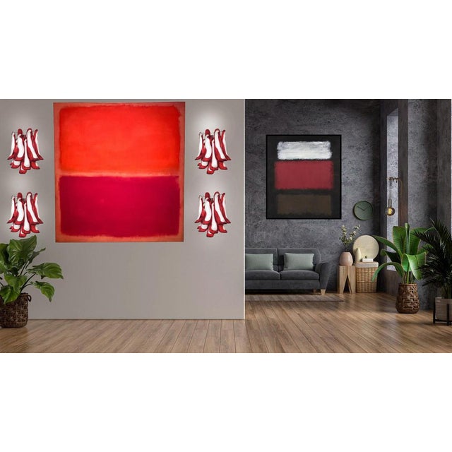 Set of four Vintage Italian Murano appliques in the manner of Mazzega. Wall lights have 10 red and white “lattimo” glasses...
