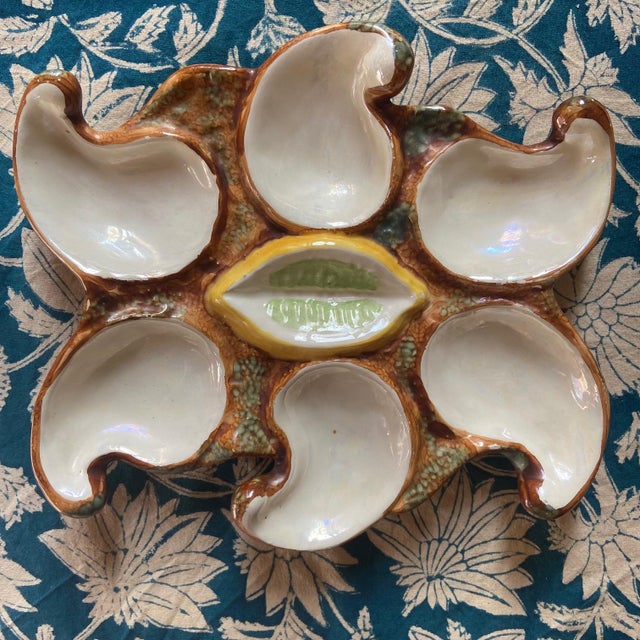 For a gourmet oyster meal for two. These vintage oyster French plates are as beautiful as they are surprising. Not signed...