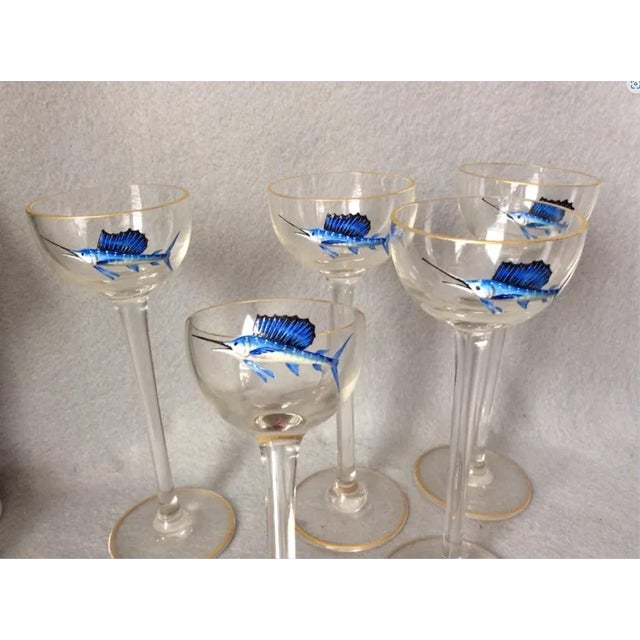 A very nice set of 5 Antique Cordial Glasses. The Glasses are hand painted in enamel with a Swordfish and the fish are...