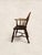 Antique English Oak Windsor 19th Century Chair A Windsor armchair with a pierced central splat and swept arms that somehow...