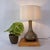 This elegant vintage opaline glass table lamp, produced in Portugal during the 1960s, is a refined example of mid-century...