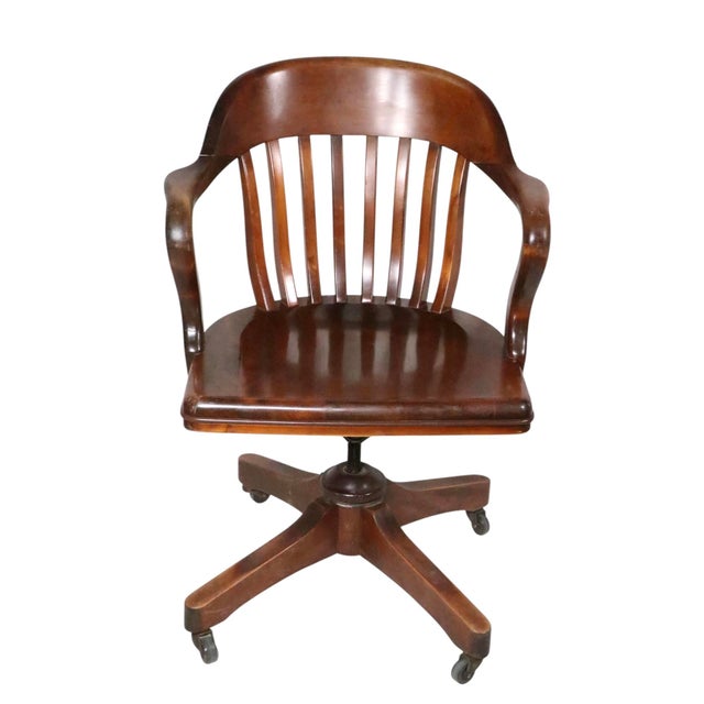 Classic Bank of England, Jury style swivel tilt adjustable desk chair, by the Sikes furniture company. The chair features...
