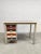 You rarely come across this cheerful steel desk from gispen. Period: 1950s. Crazy multi-color drawers and a sleek dark...
