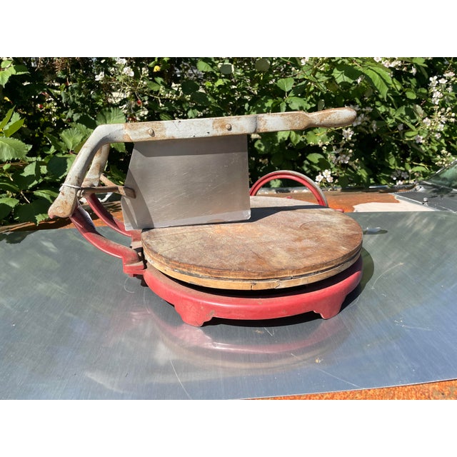 Here we have another really nice this. This is an antique industrial cast iron computing cheese slicer in working order...