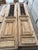 Beautiful pair of antique solid wooden doors,featuring intricate wrought iron grilles, raised panels,opening windows,and...