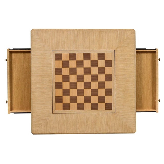 Traditional form meets modern finish in this light cerused oak game table. The reversible game table top can rotate to...