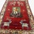 An exceptional and highly collectible vintage Turkish rug from Sivas, dated 1949, featuring a rare and symbolic figural...