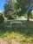 Mid-Century Modern Vintage Wrought Iron Patio Set Attributed to Woodard Furniture's Orleans Collection For Sale - Image 3 of 13