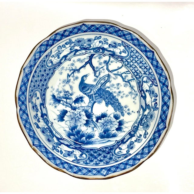 Vintage Blue and White Scalloped Peacock Bowl, Sadek Collection. A hand painted Japanese bowl featuring a peacock and...