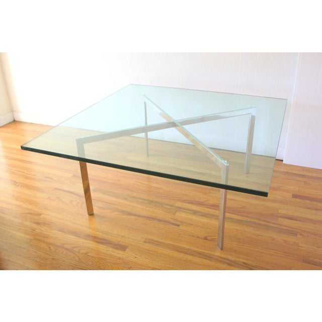 This is a mid century modern square glass topped chrome base coffee table. It has a beautiful cross chrome base, and 1/2″...