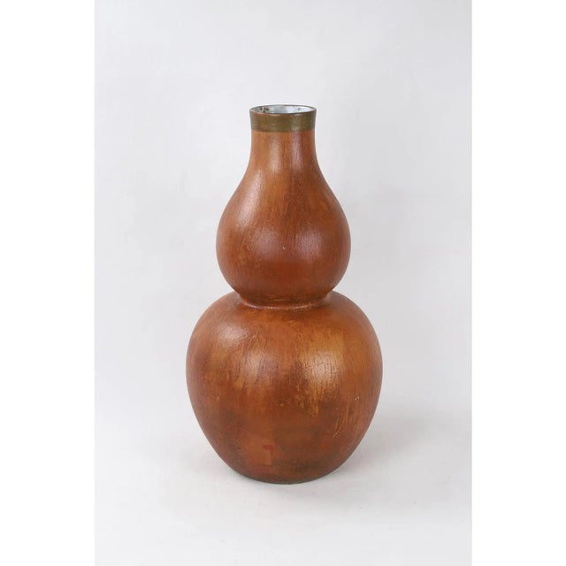 This volcanic colored vintage double gourd porcelain vase will bring an energetic warmth into your space. size：12ʺW × 12ʺD...