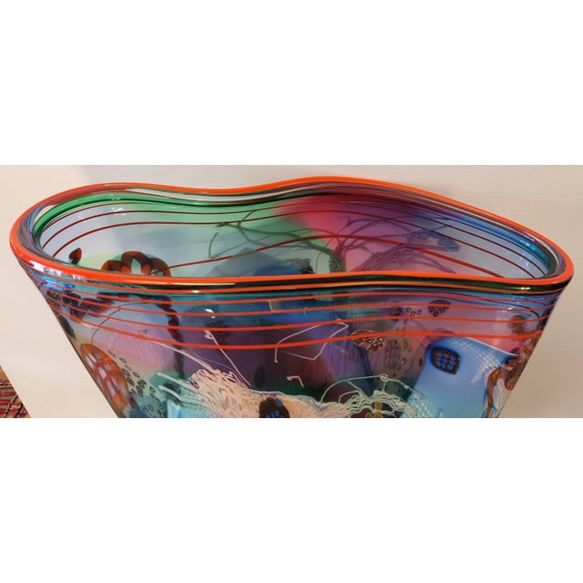 The vase measures 22" h X 18" a X 7" d. We do not know if if it is signed. However, we have an email that says he did this...