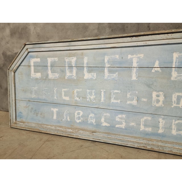 Antique advertising board billboard from Belgium from the period 1900/1920. This large antique advertising board is made...