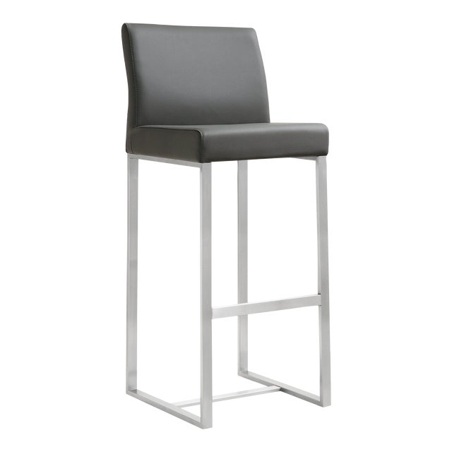 Furnish your kitchen or bar area in contemporary style with the Denmark bar stool from TOV. The solid stainless steel...