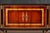 Handcrafted in Spain, this sideboard features Bohemian rosewood and oak burl veneers arranged in striking geometric...