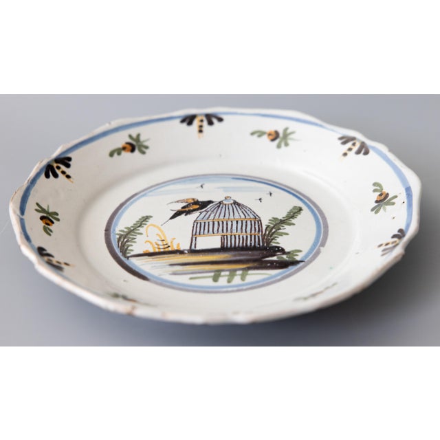 18th Century Nevers Polychrome Tin-Glazed Faïence Earthenware Plate, Bird and Cage For Sale - Image 4 of 7