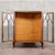 This refined living room display cabinet embodies classic elegance, distinguished by its curved lines that define its...