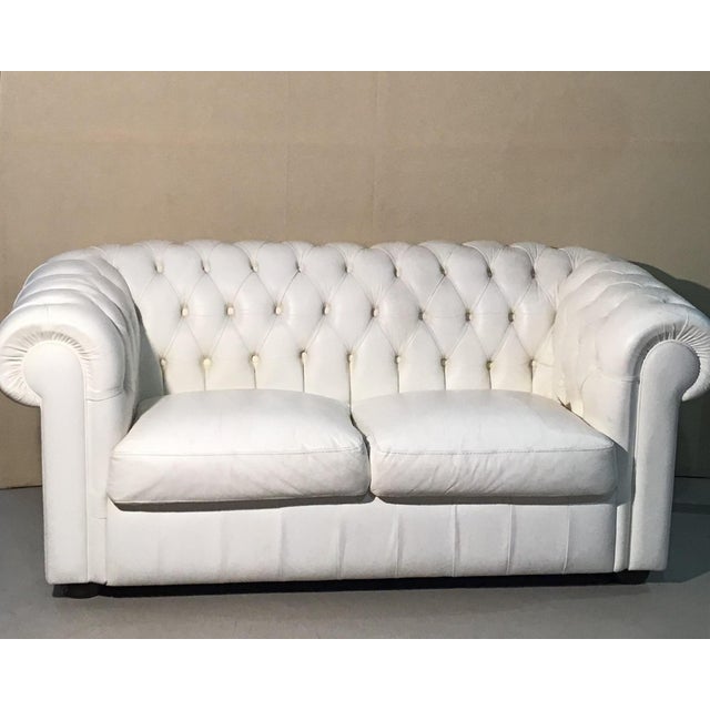Chesterfield style white sofa. this sofa model is synonymous with elegance and class within any architectural and...