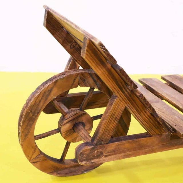 Decorative wooden wheelbarrow planter