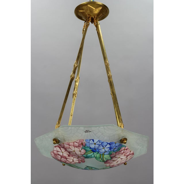 This superb Art Deco molded, frosted, and hand-painted octagonal glass bowl features a floral design - hortensias - in...