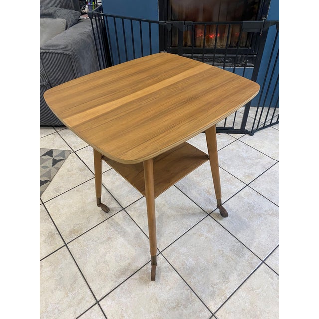 Very rare and very original swivel top table in very good condition Wheeled compass style feet Length 63cm Width 57cm...