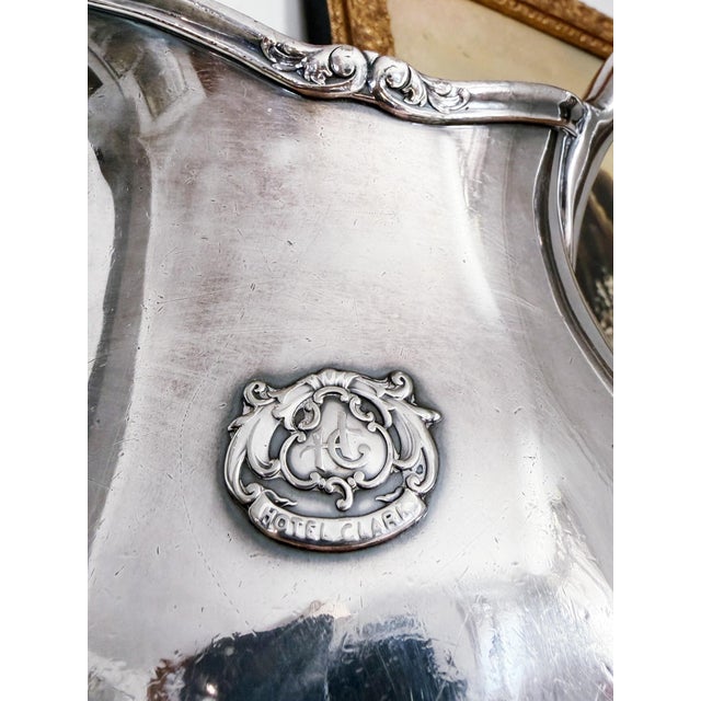 A wonderful antique circa 1920s heavy silver plated water pitcher from the Hotel Clark in Los Angeles California! In great...