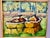 This is a framed impressionist oil painting of two yellow boats on green water, similar in style to mid-century seascape...
