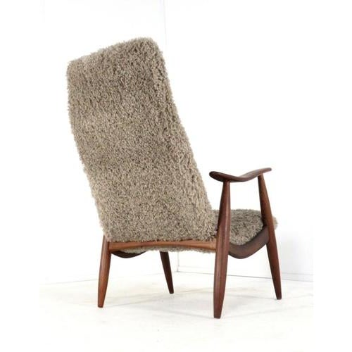 An exclusive, funky armchair—one of a kind in the world! Discover the perfect blend of vintage design and modern comfort...