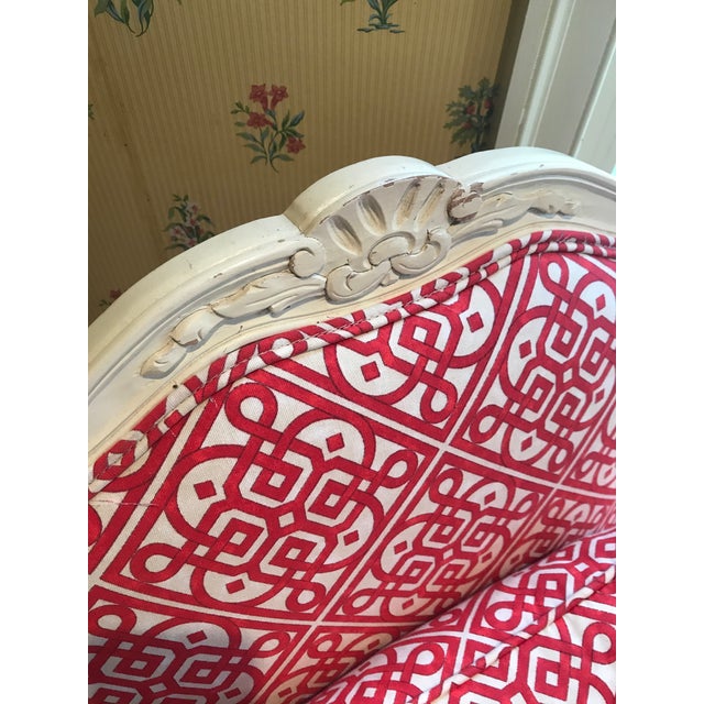 Beautiful cream white painted wood Bergere Chairs have been recently recovered in a stunning red and white scroll...