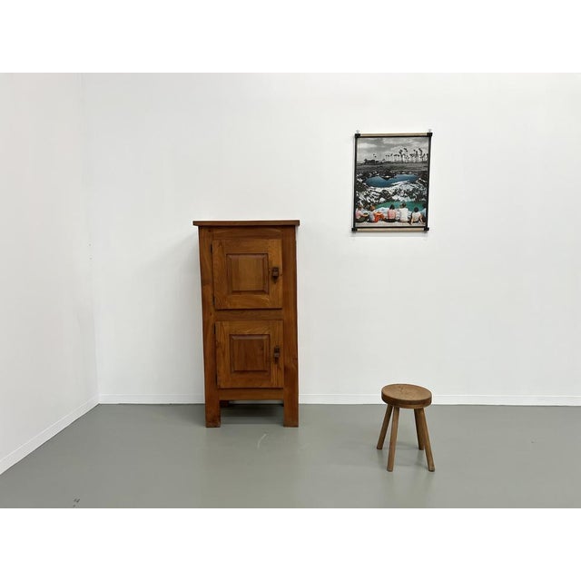 A very beautiful unique piece presented here. This is a lovely piece of french cabinetmaking from the 1950s. The beauty...