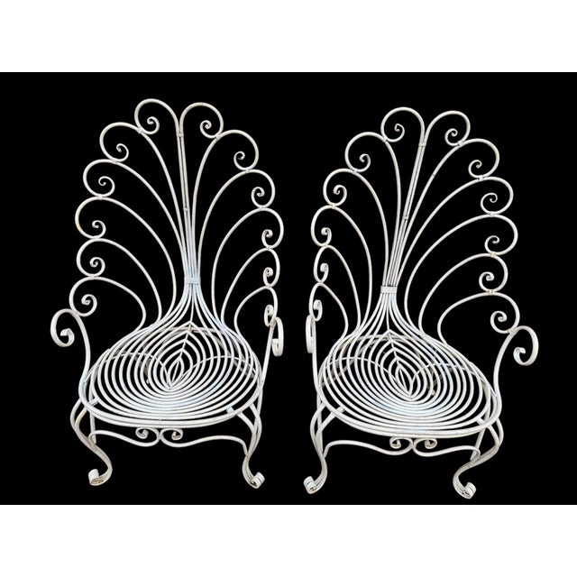 Magnificent and enormous set of 2 Provençal wrought iron armchairs from the 60s painted white