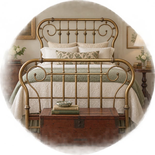 Antique Art Nouveau full-size brass bed, circa 1900, featuring a tall headboard and footboard with sweeping scrollwork,...