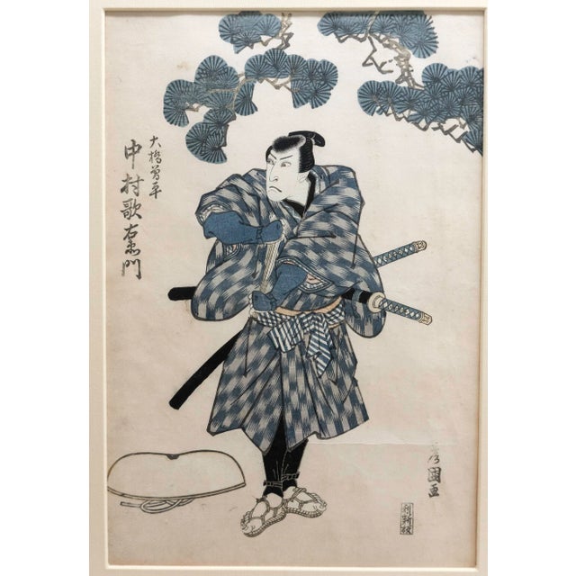 Japanese block print attributed to Kunisada (1786-1864). It represents a warrior figure as played by a Kabuki theater...