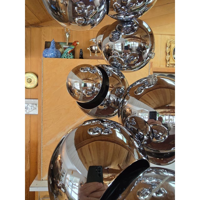 A rare and very compelling example of the best mid century modern era hanging light fixture / chandelier attributed to...