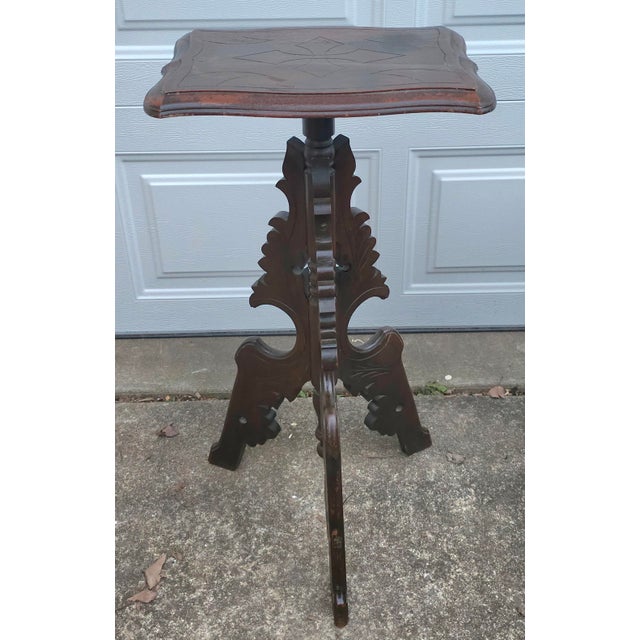 19th Century Eastlake patinated Carved Walnut Stand Pedestal. Measures 17" in width, 17" in depth and 31" in height. Top...