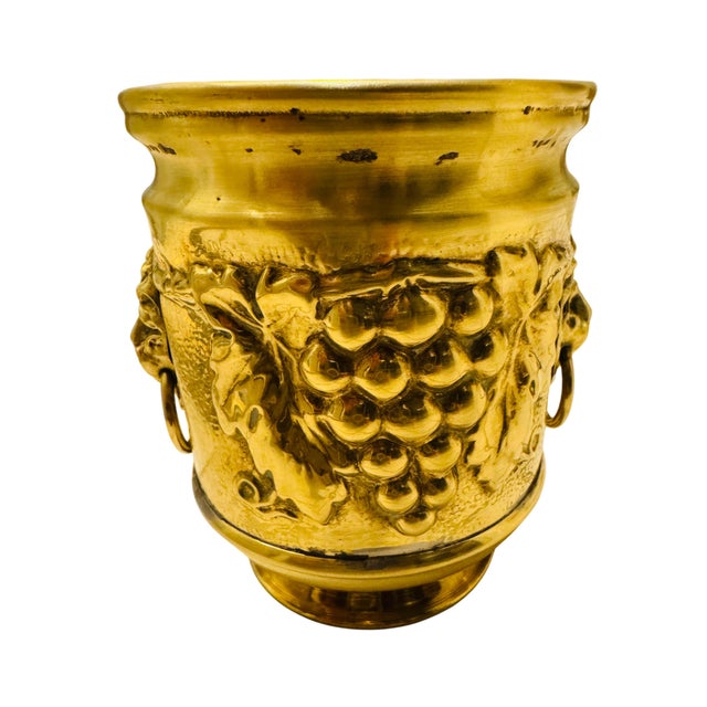 Gorgeous small hammered single-sheet brass planter made by Lombard in England circa the late 19th century. Art nouveau...